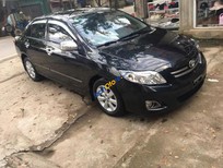 Cần bán xe Toyota Corolla altis 2011 - Gia đình bán xe Toyota Corolla Altis sản xuất năm 2011, màu đen