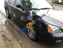 Daewoo Magnus    2004 - Cần bán lại xe Daewoo Magnus sản xuất 2004, màu đen