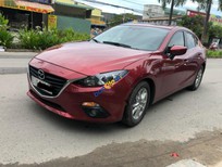 Cần bán Mazda 323 1.5 AT 2016 - Bán xe Mazda 323 1.5 AT sản xuất năm 2016, màu đỏ