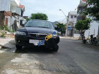 Cần bán xe Mazda 626 2002 - Cần bán lại xe Mazda 626 sản xuất 2002, màu đen