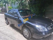 Cần bán xe Daewoo Nubira 2006 - Gia đình bán xe cũ Daewoo Nubira năm 2006, màu đen