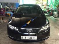 Cần bán xe Kia Forte 2011 - Cần bán Kia Forte năm sản xuất 2011, màu đen xe gia đình