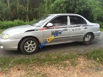 Cần bán xe Kia Spectra 2004 - Bán ô tô Kia Spectra sản xuất 2004, màu bạc chính chủ, giá chỉ 128 triệu