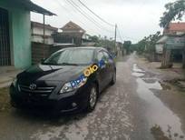 Bán xe oto Toyota Corolla altis 2009 - Bán xe Toyota Corolla Altis đời 2009, màu đen, máy êm ru