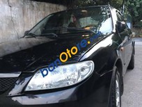 Mazda 323 2004 - Bán Mazda 323 sản xuất năm 2004, màu đen giá cạnh tranh