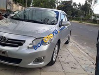 Cần bán Toyota Corolla altis  G MT 2010 - Bán lại xe Toyota Corolla altis G MT sản xuất 2010, màu bạc