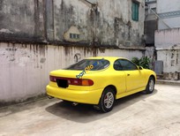 Bán xe oto Toyota Celica 1.8MT 1993 - Cần bán Toyota Celica 1.8MT sản xuất năm 1993, màu vàng, nhập khẩu