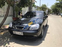 Bán xe oto Daewoo Nubira 2002 - Cần bán gấp Daewoo Nubira sản xuất năm 2002, màu đen