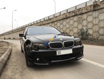 Bán BMW 7 Series 750 Li 2005 - Cần bán BMW 750Li SX 2005, ĐK lần đầu 2007, màu đen + body kit + chính chủ