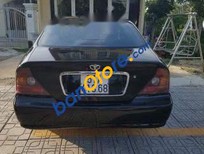 Daewoo Magnus  2.5L AT 2004 - Cần bán lại xe Daewoo Magnus 2.5L AT năm sản xuất 2004, màu đen