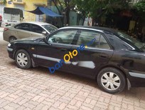 Mazda 626   2005 - Cần bán lại xe Mazda 626 năm sản xuất 2005, màu đen, 175 triệu