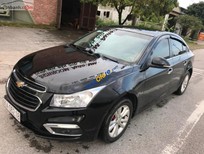 Bán Chevrolet Cruze LT 1.6 MT 2015 - Cần bán Chevrolet Cruze LT 1.6 MT năm sản xuất 2015, màu đen số sàn, giá chỉ 395 triệu