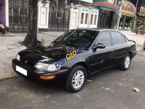 Toyota Corolla altis 1993 - Bán ô tô Toyota Corolla altis sản xuất năm 1993, màu đen còn mới, giá tốt