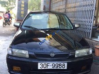 Cần bán Mazda 323 G 2000 - Cần bán xe Mazda 323 G sản xuất năm 2000, màu đen, xe nhập