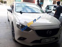 Cần bán xe Mazda 6  AT 2014 - Cần bán lại xe Mazda 6 AT sản xuất 2014, màu trắng, giá tốt