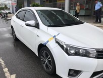 Cần bán xe Toyota Corolla altis 1.8G AT 2015 - Bán ô tô Toyota Corolla Altis 1.8G AT năm sản xuất 2015, màu trắng  