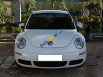 Bán xe oto Volkswagen Beetle   1.6AT 2009 - Cần bán lại xe Volkswagen Beetle 1.6AT sản xuất 2009, màu trắng, xe nhập, 520tr