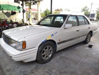 Bán xe oto Mazda 929 LX 1988 - Cần bán lại xe Mazda 929 LX sản xuất 1988, màu trắng, nhập khẩu