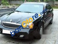 Cần bán xe Daewoo Magnus 2004 - Bán Daewoo Magnus 2004, màu đen, nhập khẩu, kích thước thân xe nhỏ gọn. 