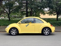 Bán xe oto Volkswagen New Beetle 1.6AT 2009 - Cần bán Volkswagen Newbeetle 1.6AT, sản xuất năm 2009, đăng kí 2010, 1 chủ, lăn bánh 80.000km
