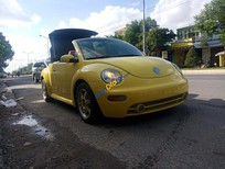 Cần bán xe Volkswagen New Beetle    2003 - Bán Volkswagen New Beetle năm 2003, màu vàng, nhập khẩu ít sử dụng