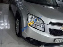 Cần bán Chevrolet Orlando 2013 - Bán xe Chevrolet Orlando sản xuất 2013, màu bạc, nhập khẩu nguyên chiếc xe gia đình, giá tốt