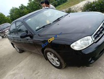 Cần bán Kia Spectra   2004 - Cần bán gấp Kia Spectra sản xuất năm 2004, màu đen, nhập khẩu nguyên chiếc xe gia đình giá cạnh tranh