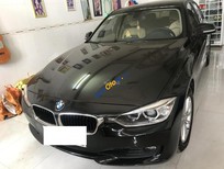 BMW 3 Series 320i 2013 - Bán ô tô cũ BMW 3 Series 320i sản xuất 2013, màu đen 