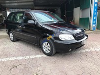 Cần bán Kia Carnival GS 2006 - Cần bán lại xe Kia Carnival GS năm sản xuất 2006, màu đen, xe nhập