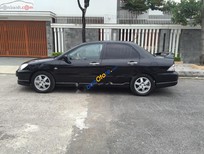 Bán xe oto Mitsubishi Lancer 2.0 AT 2005 - Cần bán gấp Mitsubishi Lancer 2.0 AT sản xuất năm 2005, màu đen  