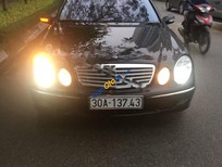 Mercedes-Benz M class 2003 - Bán Mercedes đời 2003, màu đen, Đk 2004