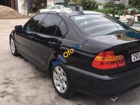 Cần bán BMW 3 Series  318i 2006 - Bán BMW 3 Series 318i năm 2006, màu đen, nhập khẩu 