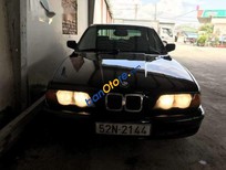 Cần bán xe BMW 3 Series  350i  1990 - Cần bán BMW 3 Series 350i năm 1990, màu đen, giá chỉ 75 triệu