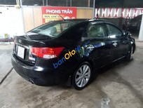 Kia Forte 2010 - Cần bán xe Kia Forte năm 2010, màu đen số sàn, 233tr