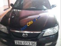 Mazda 323 2002 - Bán Mazda 323 năm sản xuất 2002, màu đen