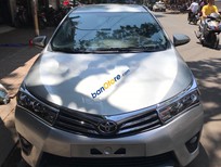 Toyota Corolla altis 1.8G 2014 - Bán Toyota Corolla Altis 1.8G năm 2014, màu bạc xe gia đình