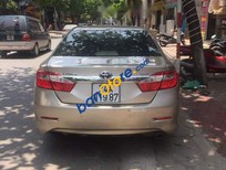 Cần bán Toyota Camry 2013 - Cần bán lại xe Toyota Camry năm 2013, màu vàng, nhập khẩu nguyên chiếc chính chủ, giá tốt