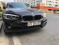 Bán xe oto BMW 1 Series 118i 2015 - Cần bán gấp BMW 1 Series 118i sản xuất năm 2015, màu đen, xe nhập