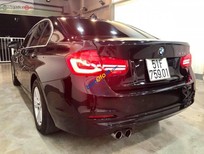 BMW 3 Series 320i 2016 - Bán BMW 320i sản xuất 2016, màu đen, 1 đời chủ