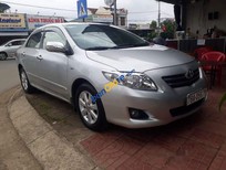 Cần bán Toyota Corolla altis G MT 2010 - Bán Toyota Corolla Altis G MT sản xuất 2010, màu bạc xe gia đình