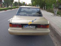 Cần bán Nissan Bluebird 1987 - Bán Nissan Bluebird sản xuất năm 1987, màu vàng, nhập khẩu