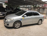 Cần bán xe Toyota Corolla altis 1.8G MT 2009 - Bán Toyota Corolla Altis 1.8G MT sản xuất 2009, màu bạc như mới, 398 triệu