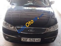 Ford Laser   2004 - Cần bán lại xe Ford Laser năm 2004, màu đen, nhập khẩu  