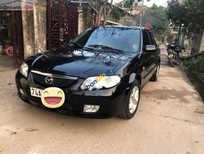 Mazda 323 2002 - Bán xe Mazda 323 năm 2002, màu đen, xe nhập chính chủ giá cạnh tranh