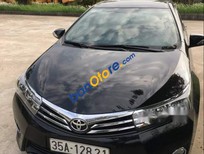 Toyota Corolla altis 2014 - Bán Toyota Corolla altis năm 2014, màu đen, giá chỉ 615 triệu