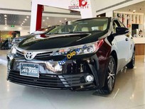 Toyota Corolla altis 2019 - Cần bán xe Toyota Corolla altis sản xuất năm 2019, màu đen, giá 657tr