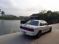 Mazda 323F    1996 - Cần bán lại xe Mazda 323F sản xuất 1996, màu trắng, xe nhập