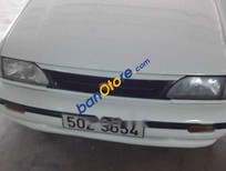 Kia Pride 2001 - Cần bán Kia Pride sản xuất 2001, màu trắng, xe có kiểu dáng thể thao, rất đẹp