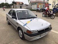 Bán xe oto Mazda 323  MT 1996 - Cần bán Mazda 323 MT năm 1996, màu bạc, 50 triệu