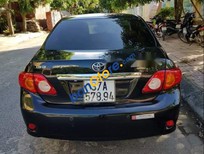 Cần bán Toyota Corolla altis G 2010 - Bán xe Toyota Corolla altis G năm sản xuất 2010, màu đen